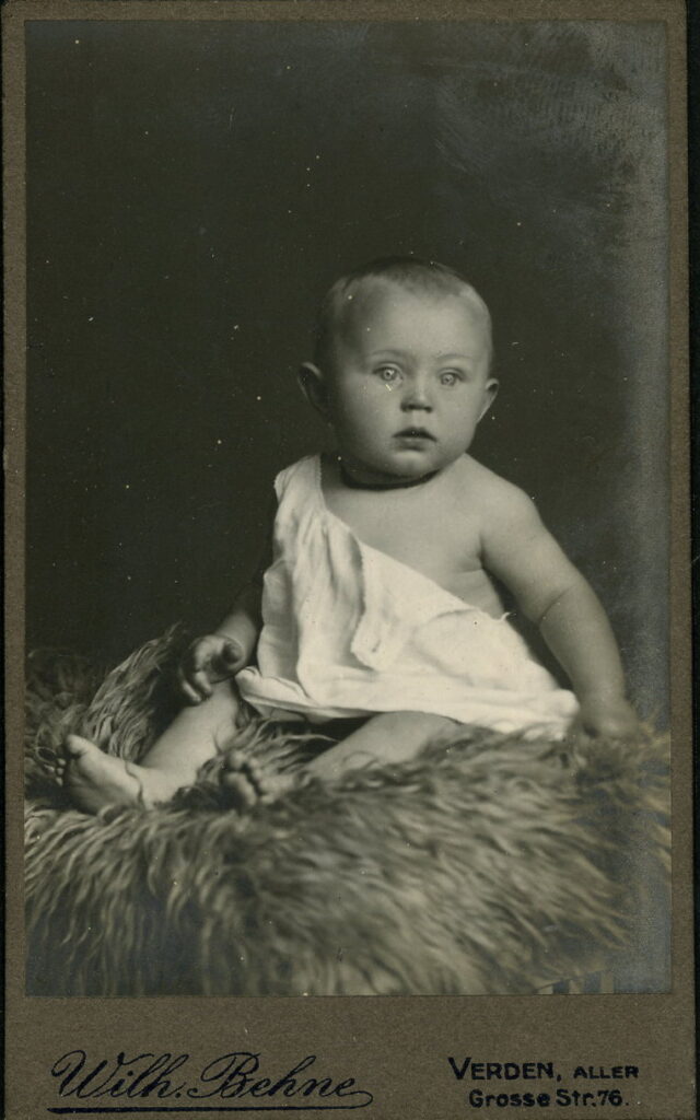 A monochrome photographic portrait from between 1865 and the 1920s taken by Wilh. Behne, Grosse-Straße 76, Verden