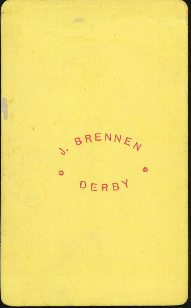 Reverse of a monochrome photographic portrait from between 1865 and the 1920s taken by J. Brennen, Derby, UK