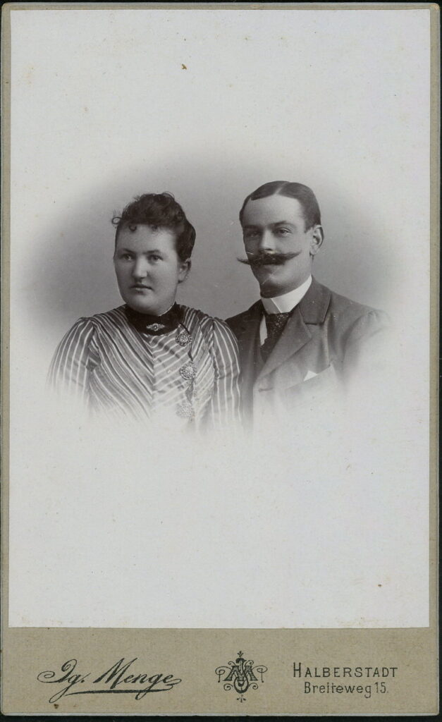 A monochrome photographic portrait from between 1865 and the 1920s taken by Ig. Menge, Breiteweg 15, Halberstadt