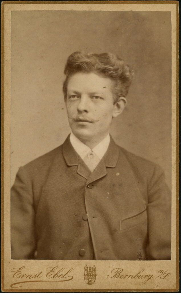 A monochrome photographic portrait from between 1865 and the 1920s taken by Ernst Ebel, Wilhelm-Straße, Bernburg a. S.