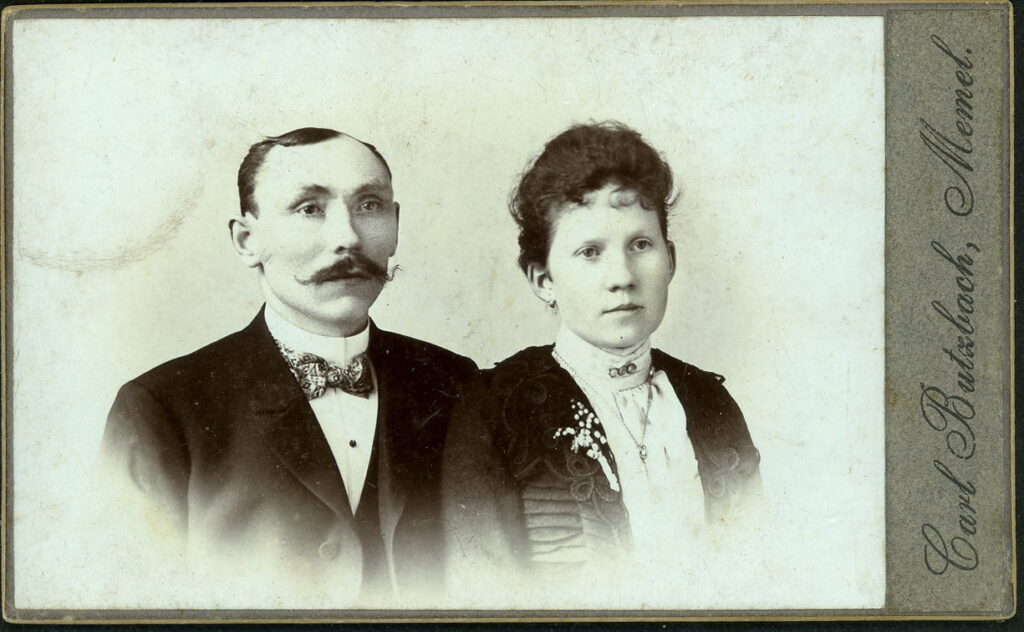 A monochrome photographic portrait from between 1865 and the 1920s taken by Carl Butzbach, Memel (Klaipėda), Lithuania