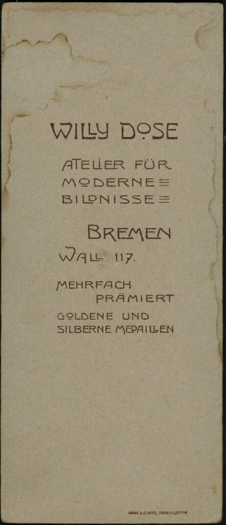 Reverse of a monochrome photographic portrait from between 1865 and the 1920s taken by Willy Dose, Wall 117, Bremen