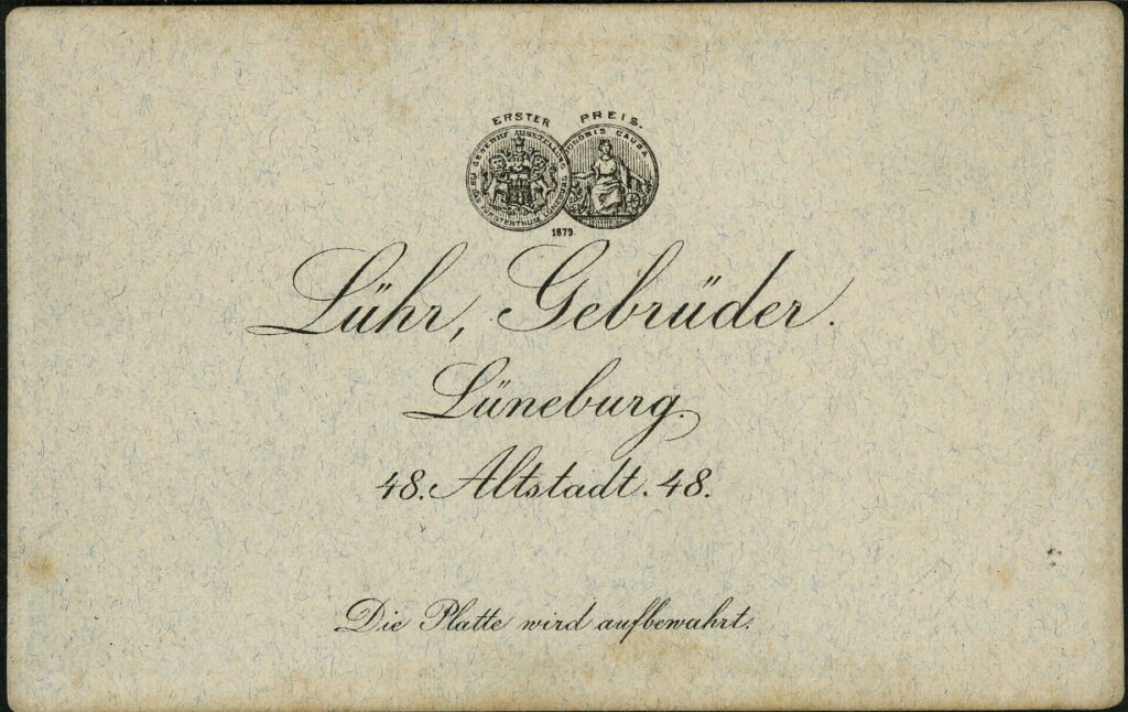 Reverse of a monochrome photographic portrait from between 1865 and the 1920s taken by Gebr. Lühr, Altstadt 48, Lüneburg