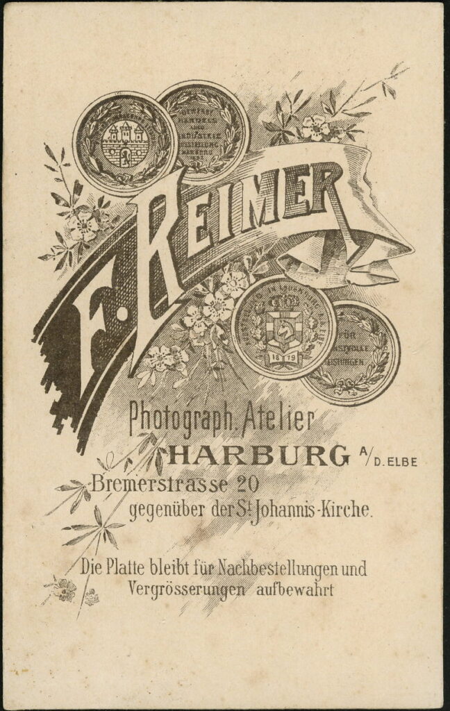 Reverse of a monochrome photographic portrait from between 1865 and the 1920s taken by F. Reimer (formerly C. Sommer), Bremerstraße 20, Harburg a. d. Elbe