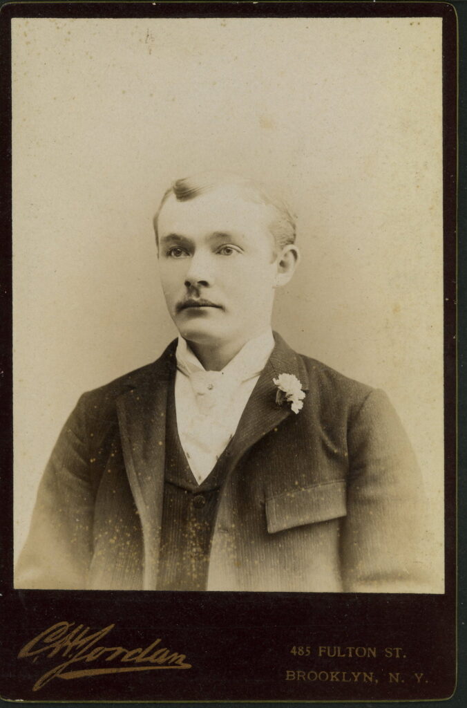 A monochrome photographic portrait from between 1865 and the 1920s taken by C. H. Jordan, 485 Fulton Street, Brooklyn, NY