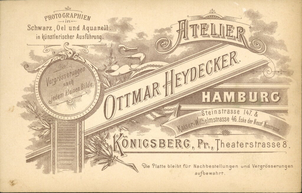 Reverse of a monochrome photographic portrait from between 1865 and the 1920s taken by Ottmar Heydecker, Steinstraße 147, Hamburg, Kaiser-Wilhelmstraße 46, Hamburg and Theaterstraße 8, Königsberg i. Pr.