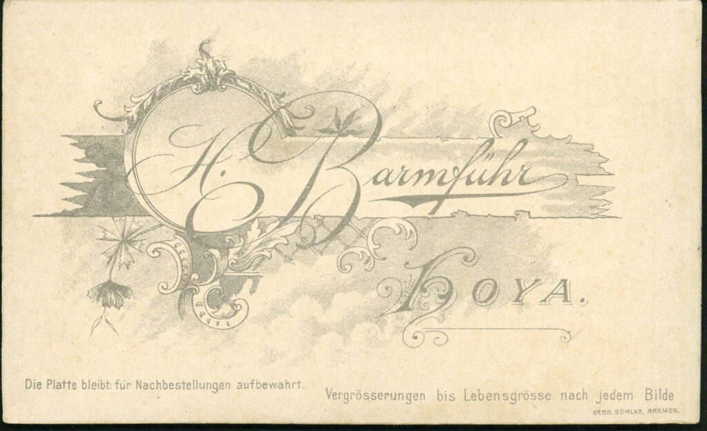 Reverse of a monochrome photographic portrait from between 1865 and the 1920s taken by H. Barmführ, Hoya