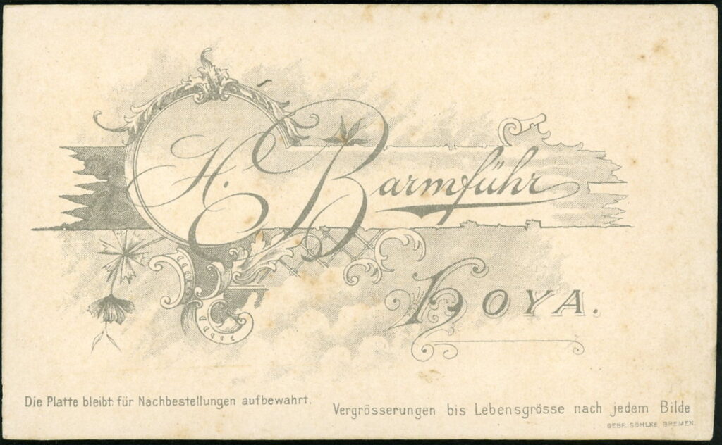 Reverse of a monochrome photographic portrait from between 1865 and the 1920s taken by H. Barmführ, Hoya