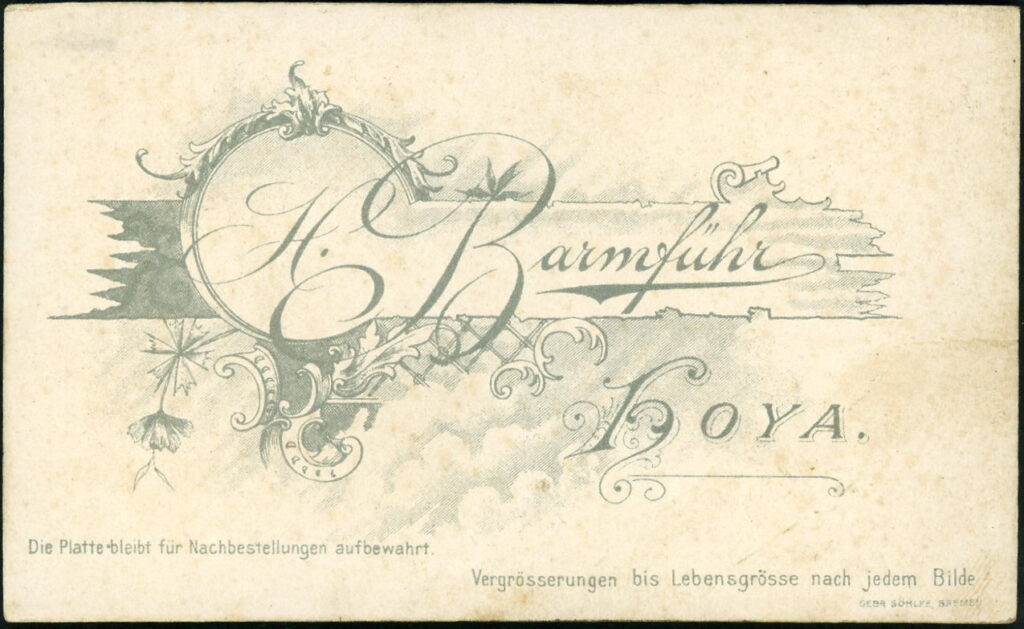 Reverse of a monochrome photographic portrait from between 1865 and the 1920s taken by H. Barmführ, Hoya