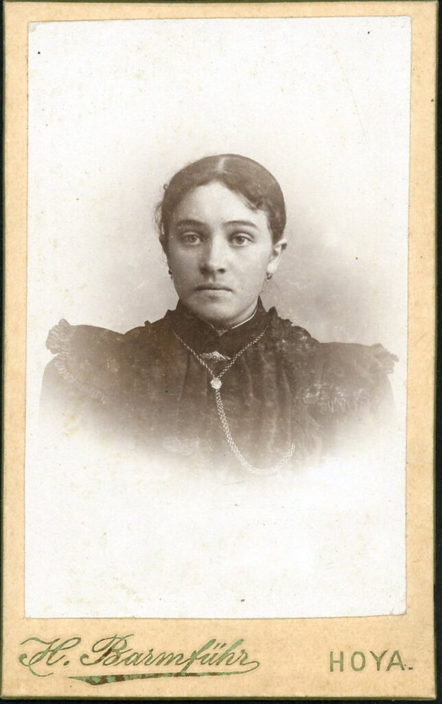 A monochrome photographic portrait from between 1865 and the 1920s taken by H. Barmführ, Hoya