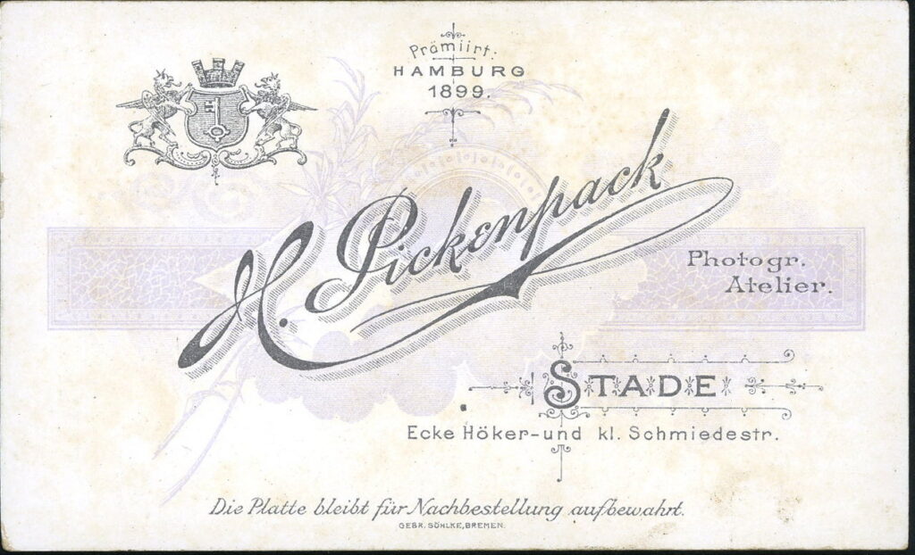 Reverse of a monochrome photographic portrait from between 1865 and the 1920s taken by H. Pickenpack, Ecke Höker- und kl. Schmiedestraße, Stade