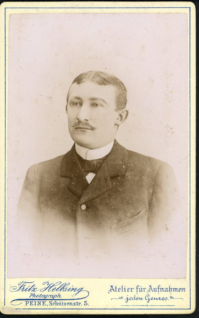 A monochrome photographic portrait from between 1865 and the 1920s taken by Fritz Helbsing, Schützen-Straße 5, Peine