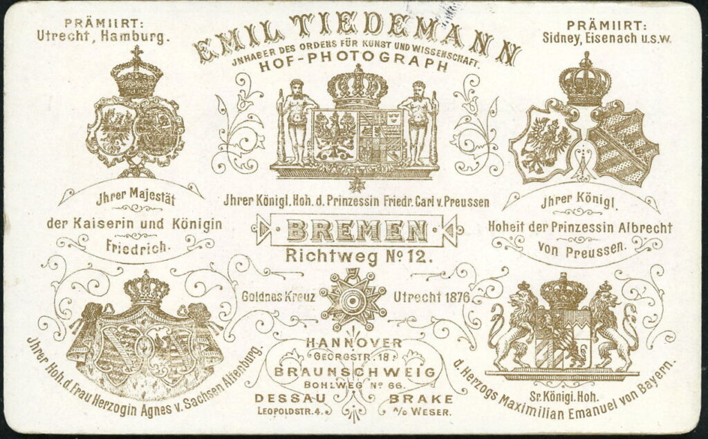 Reverse of a monochrome photographic portrait from between 1865 and the 1920s taken by Emil Tiedemann, Richtweg 12, Bremen, Ernst-August-Platz 6, Hannover, Bohlweg 66, Braunschweig, Leopoldstraße 4, Dessau, Brake a. W.