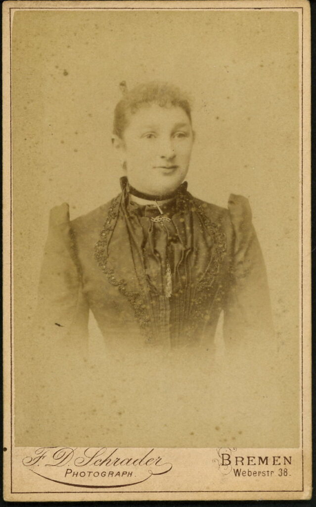 A monochrome photographic portrait from between 1865 and the 1920s taken by F. D. Schrader, Weber-Straße 38, Bremen