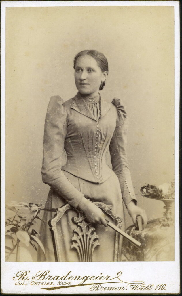 A monochrome photographic portrait from between 1865 and the 1920s taken by R. Bradengeier, formerly Jul. Ortgies, Wall 116, Bremen