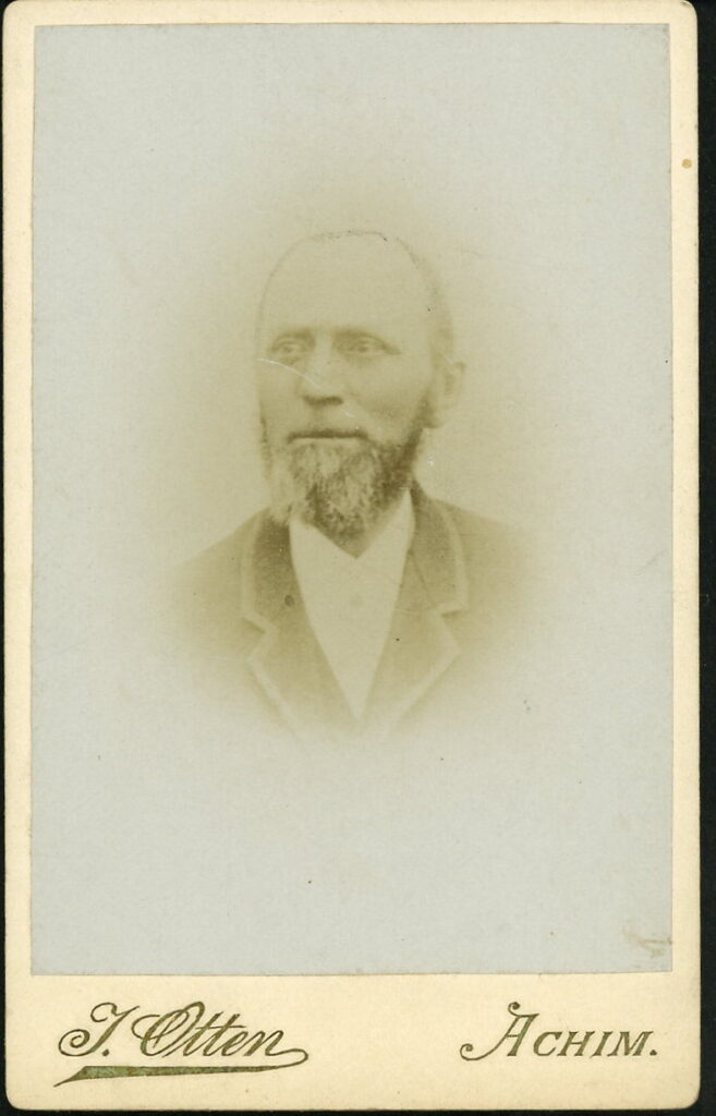 A monochrome photographic portrait from between 1865 and the 1920s taken by J. Otten, Achim