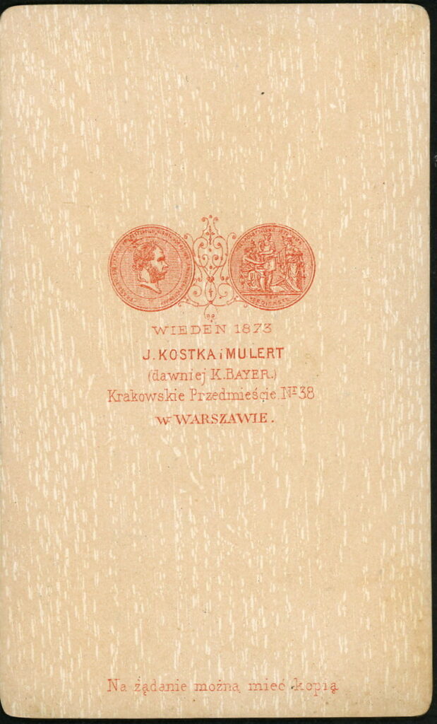 Reverse of a monochrome photographic portrait from between 1865 and the 1920s taken by J. Kostka i. Mulert, formerly K. Bayer, Krakowskie Przedmiescie 38, Warszawie