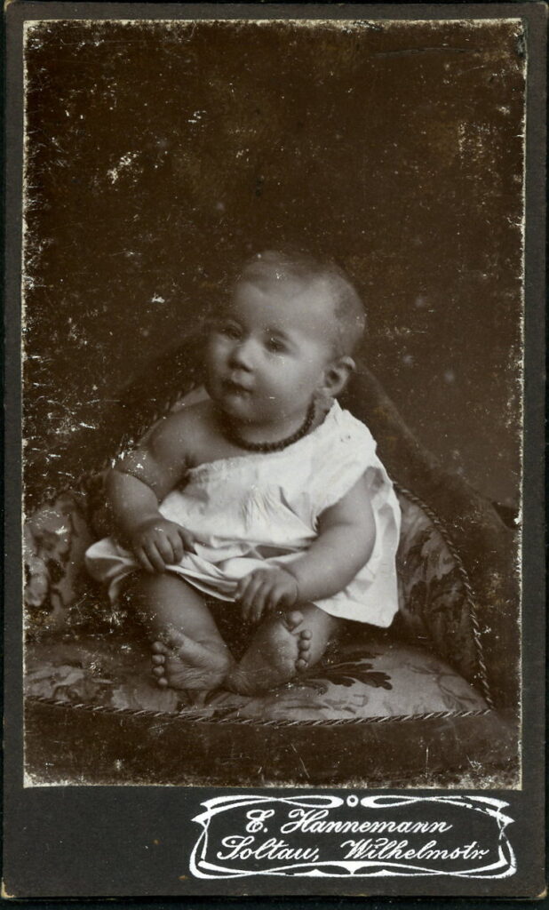 A monochrome photographic portrait from between 1865 and the 1920s taken by E. Hanemann, Wilhelmstraße, Soltau