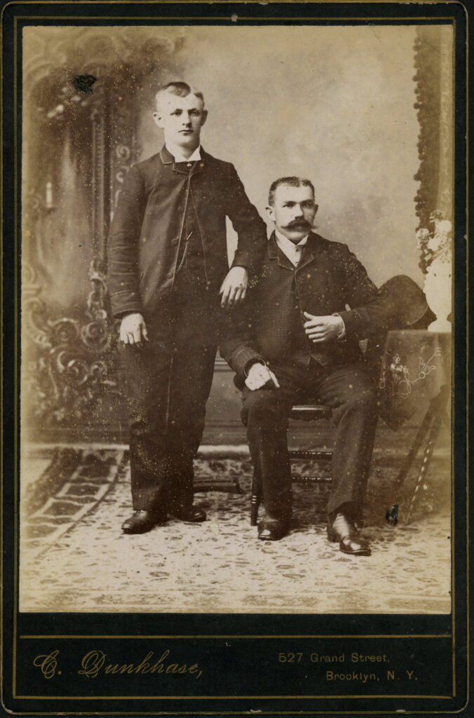 A monochrome photographic portrait from between 1865 and the 1920s taken by C. Dunkhase, 527 Grand Street, Brooklyn E.D.