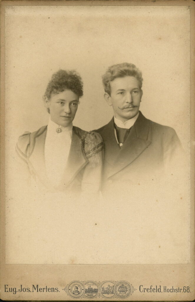 A monochrome photographic portrait from between 1865 and the 1920s taken by Eug. Jos. Mertens, Hochstraße 68, Crefeld