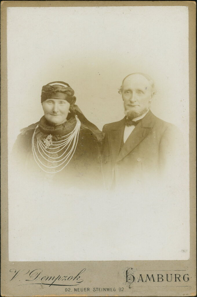 A monochrome photographic portrait from between 1865 and the 1920s taken by V. Dempzok, Neuer Steinweg 92, Hamburg