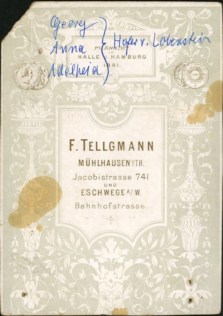 Reverse of a monochrome photographic portrait from between 1865 and the 1920s taken by F. Tellgmann, Jacobistraße 741, Mühlhausen i. Th. and Bahnhofstraße, Eschwege a. W.