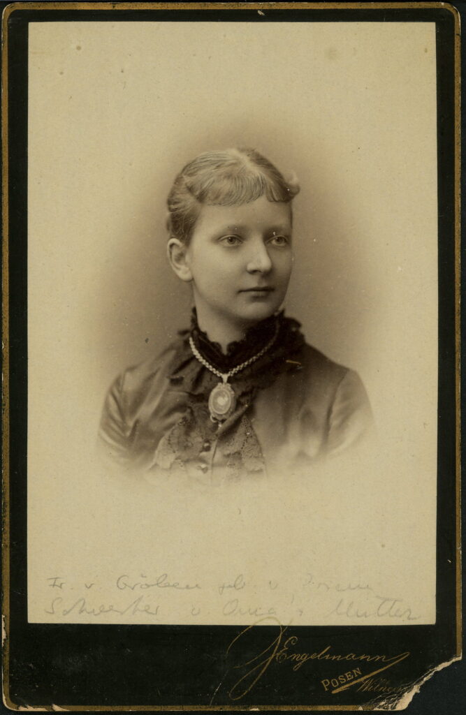 A monochrome photographic portrait from between 1865 and the 1920s taken by J. Engelmann, Wilhelm-Straße 8, Posen