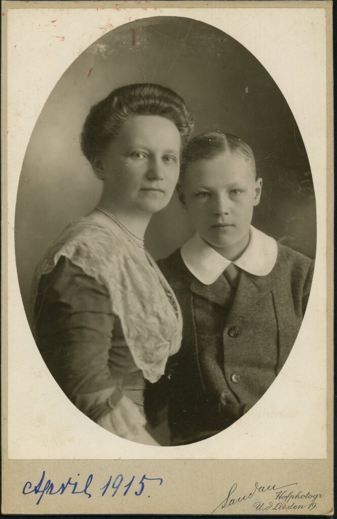 A monochrome photographic portrait from between 1865 and the 1920s taken in Atelier Sandau, Unter den Linden 19, Berlin and dated 1915