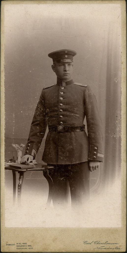 A monochrome photographic portrait from between 1865 and the 1920s taken by Carl Christensen, Neumünster