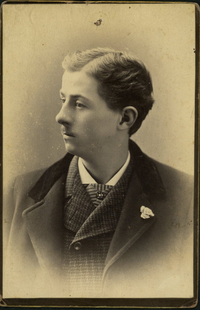 A monochrome photographic portrait from between 1865 and the 1920s taken by Gregg, 94 State Street, Rochester, NY