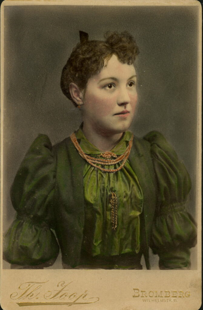 A possibly hand-coloured photographic portrait from between 1865 and the 1920s taken by Th. Joop, Wilhelmstraße 15, Bromberg