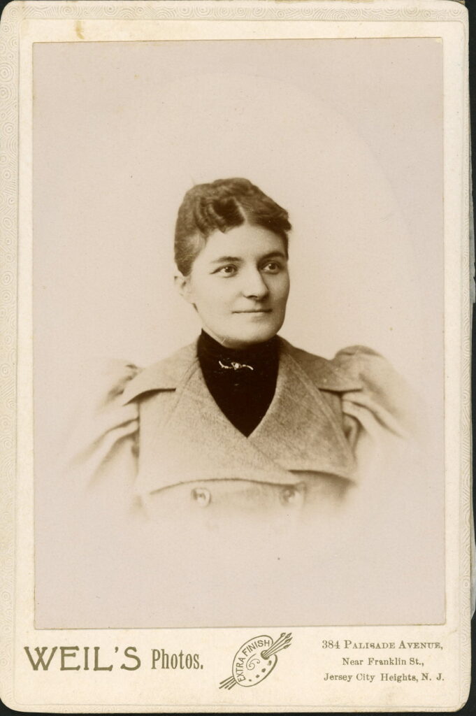 A monochrome photographic portrait from between 1865 and the 1920s taken by Weil, 384 Palisade Avenue, Jersey City Heights, New Jersey