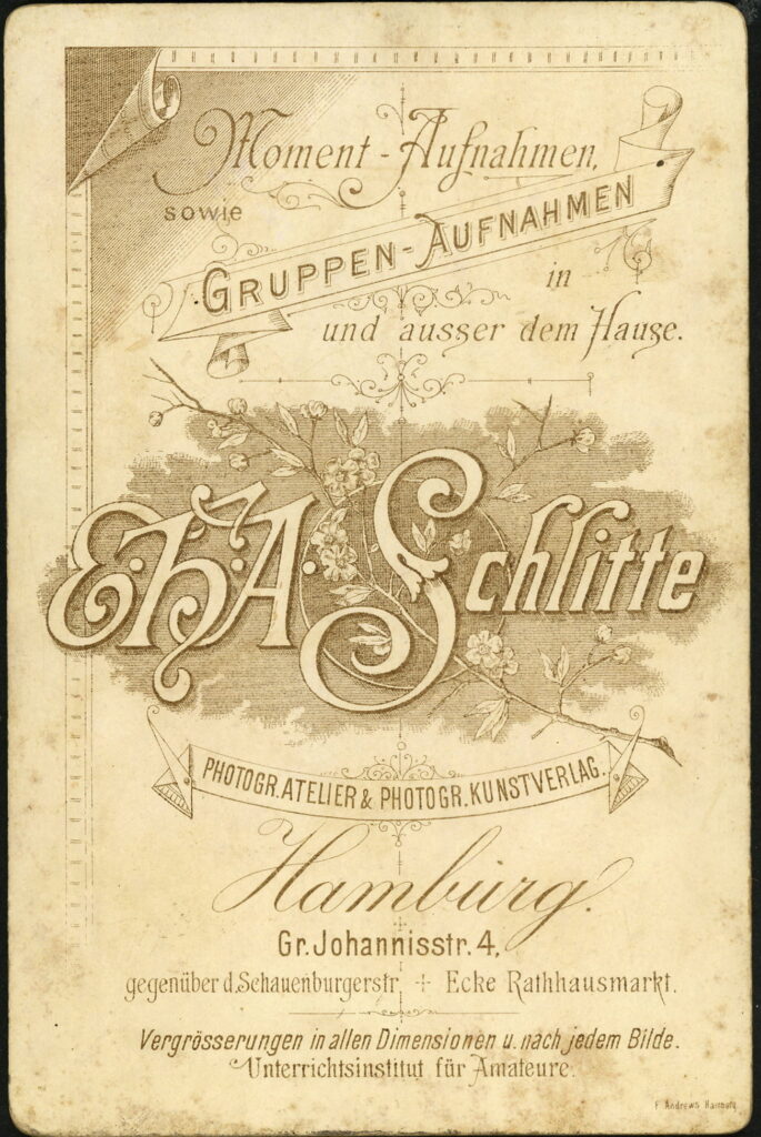 Reverse of a monochrome photographic portrait from between 1865 and the 1920s taken by E. H. A. Schlitte, Gr. Johannisstraße 4, Hamburg