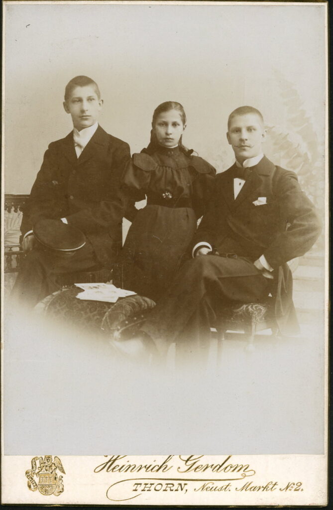 A monochrome photographic portrait from between 1865 and the 1920s taken by Heinrich Gerdom, Neust Markt 2, Thorn and dated 1897