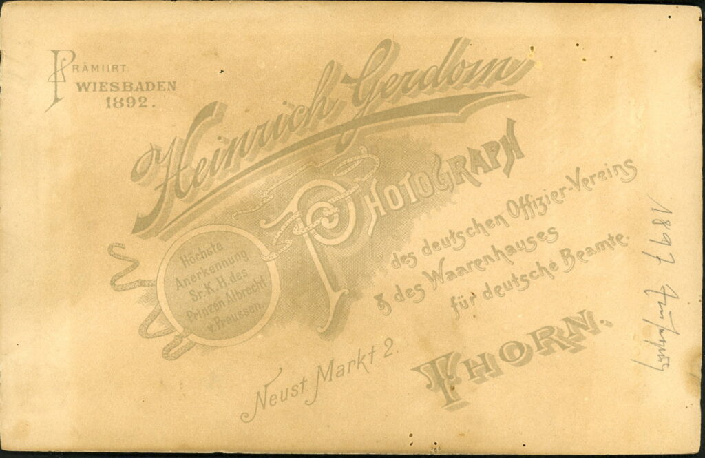 Reverse of a monochrome photographic portrait from between 1865 and the 1920s taken by Heinrich Gerdom, Neust Markt 2, Thorn and dated 1897