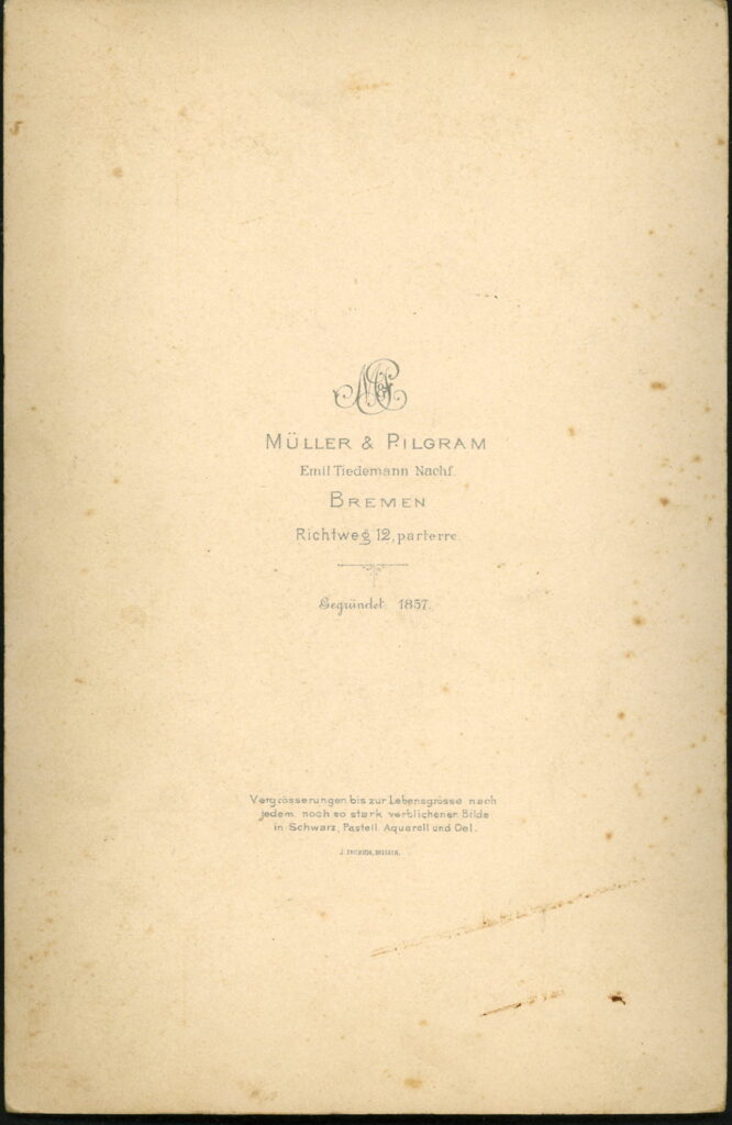 Reverse of a monochrome photographic portrait from between 1865 and the 1920s taken by Müller & Pilgrim, formerly Emil Tiedemann, Richtweg 12, Bremen