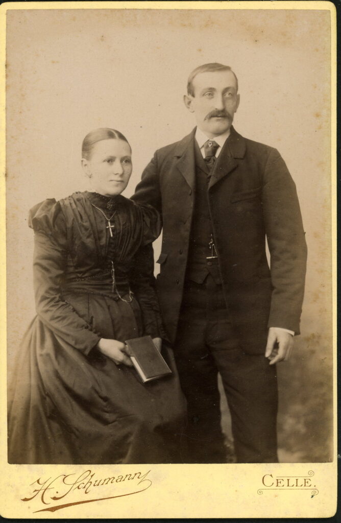 A monochrome photographic portrait from between 1865 and the 1920s taken by H. Schuhmann, Westcellerthorstraße 11, Celle.